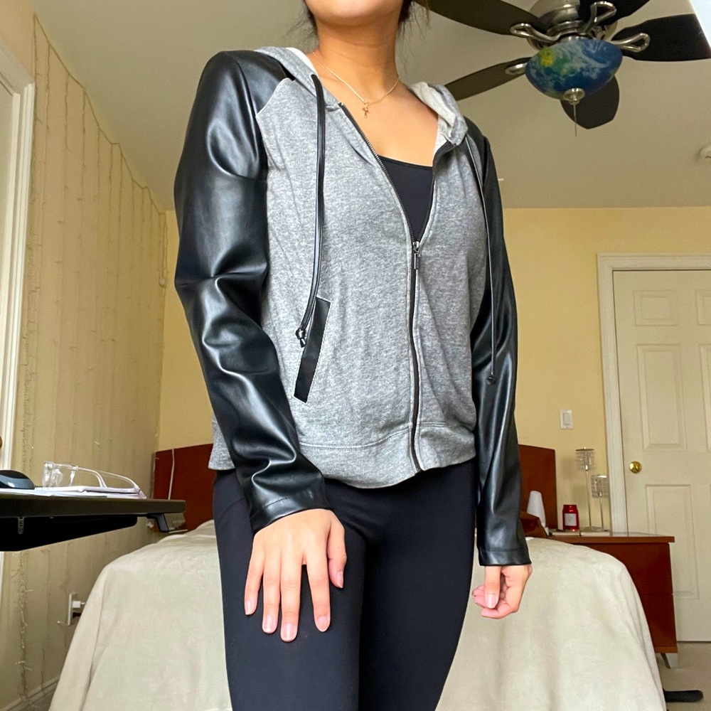 Grey and black leather jacket